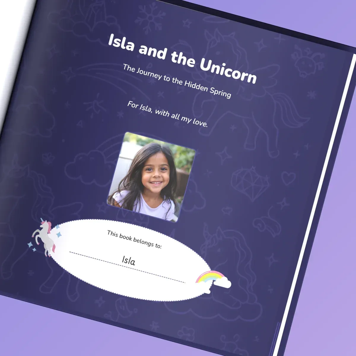 The first page of the book: a personal dedication above the girl’s photo and “This book belongs to Isla”